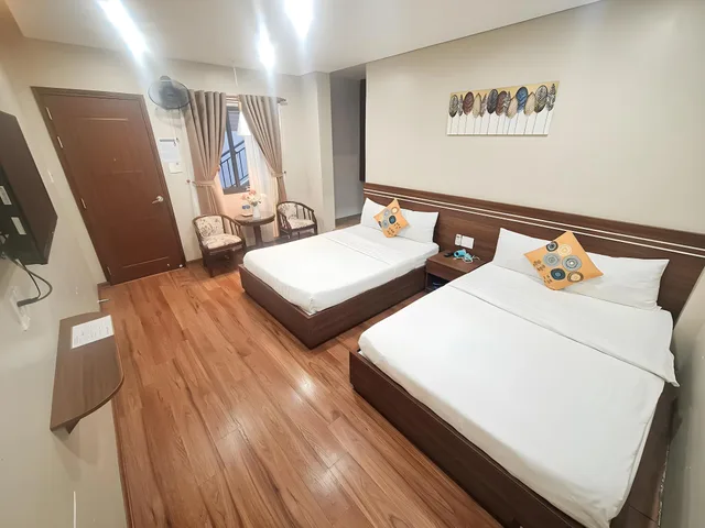 غرفة عائلية رباعية بسريرين مزدوجين بإطلالة على الحديقة، QUAN QUAN HOTEL 1/1