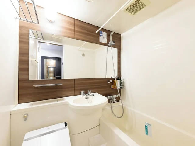غرفة قياسية بسريرين منفصلين مع أريكة، Apa Hotel Kitakami-Ekinishi 3/4