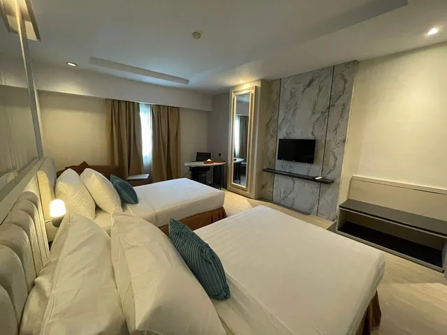 غرفة ديلوكس بسرير كوين، Abadi Suite Hotel and Tower 1/5
