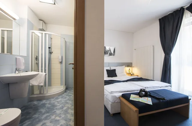 Room, Double Bed, Sofa, Hotel Blue Garni 4/4
