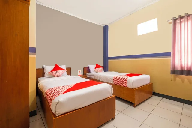 غرفة ديلوكس بسريرين منفصلين، Hotel O Riau Near Gedung Sate Formerly Patradisa 4/5