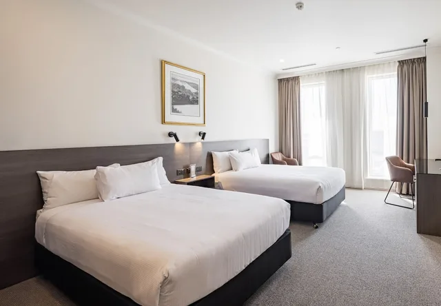 غرفة بريميير بسريرين منفصلين بإطلالة على النهر، Duxton Hotel 1/3