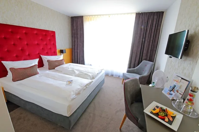 غرفة قياسية بسريرين منفصلين، Rugs Hotel Am Schlosspark Lichtenwalde 1/3