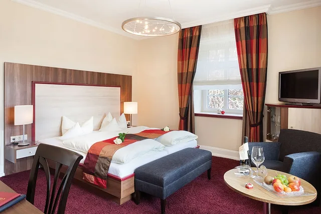 شقة بسرير مزدوج بغرفتي نوم مع أريكة، RUTERS PARKHOTEL 1/3