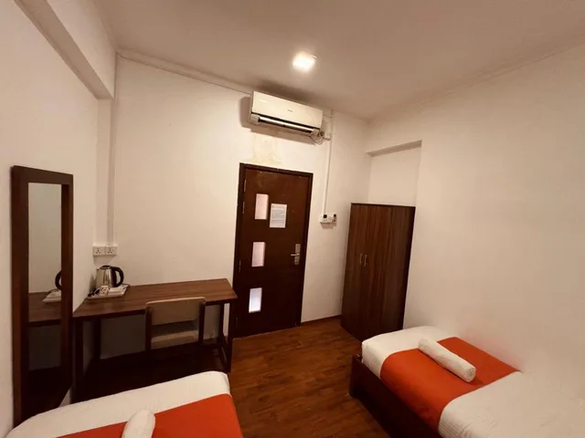 غرفة بسريرين منفصلين بحمام مشترك، CityRest Fort 4/6