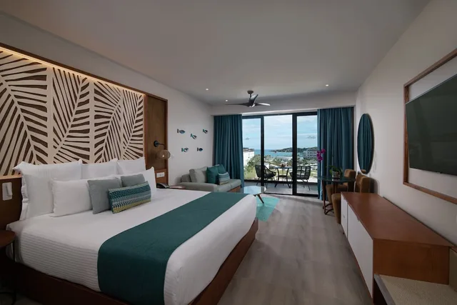 جناح جونيور بسريرين مزدوجين بإطلالة جزئية على البحر، Dreams Macao Beach Punta Cana 1/8