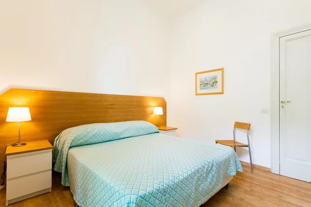 جناح عائلي بسرير كوين وسريرين منفصلين مع أريكة، Corso Italia Suites 1/10