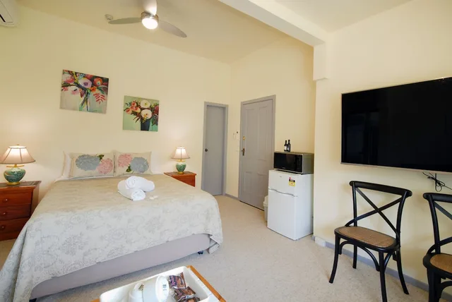 غرفة ديلوكس بسرير كوين في الطابق الأرضي، Riverview Boutique Motel 1/1