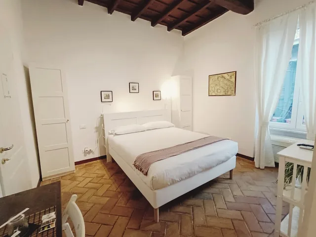 جناح بسرير كوين وسرير مزدوج، Piccolo Trevi Suites 1/5