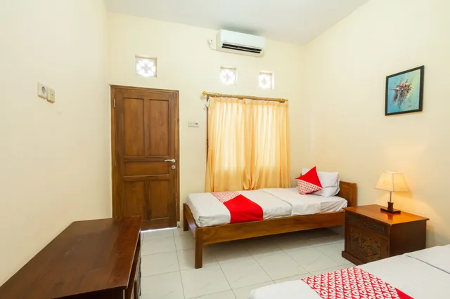 غرفة قياسية بسريرين منفصلين، OYO 1150 Omah Ladrang 1/7