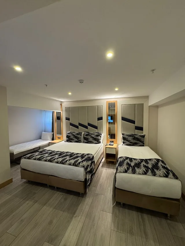 غرفة اقتصادية ثلاثية بسرير مزدوج وسرير فردي، Downtown Sirkeci Hotel 6/10