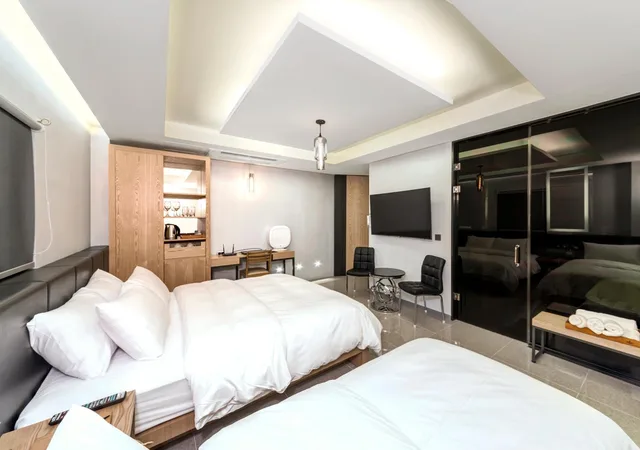 غرفة ديلوكس بسريرين منفصلين، Capace Hotel 1/5