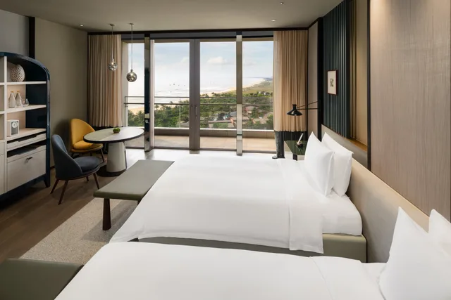 غرفة بريميير بسريرين منفصلين بإطلالة على البحر، New World Hoiana Beach Resort 1/1