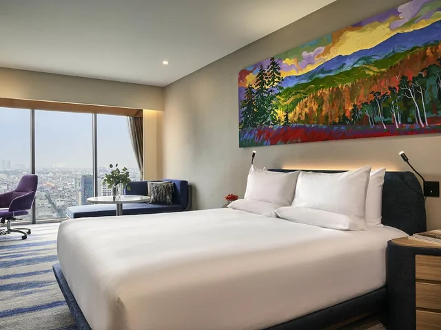 شقة تنفيذية بسريرين منفصلين بإطلالة على المدينة مع أريكة مع دخول الصالة، Novotel Hanoi Thai Ha 2/6