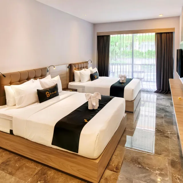 غرفة عائلية بشرفة، Graha Socio Hotel 1/8