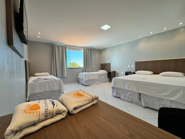 غرفة رباعية بسرير كوين وسريرين منفصلين بإطلالة على البحر، Hotel Luar De Itapua 2/9
