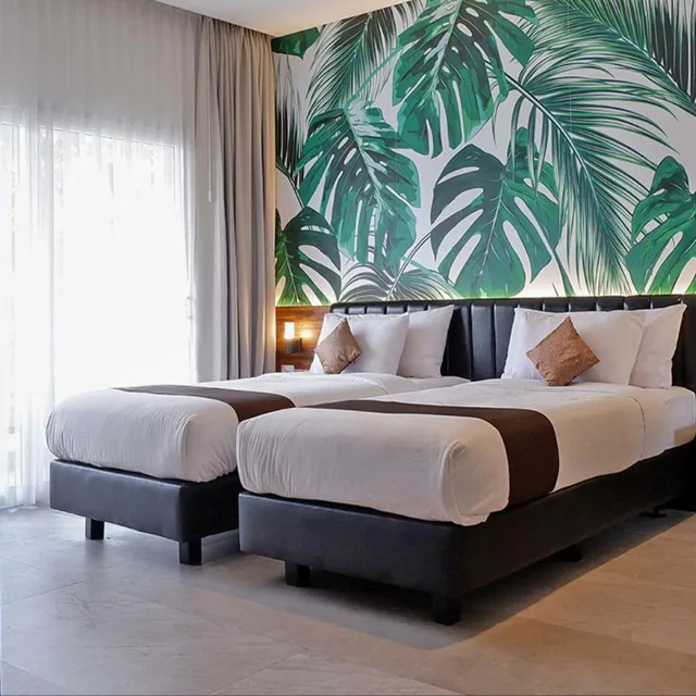 غرفة بسريرين منفصلين بشرفة، Front One Resort Magelang 2/10