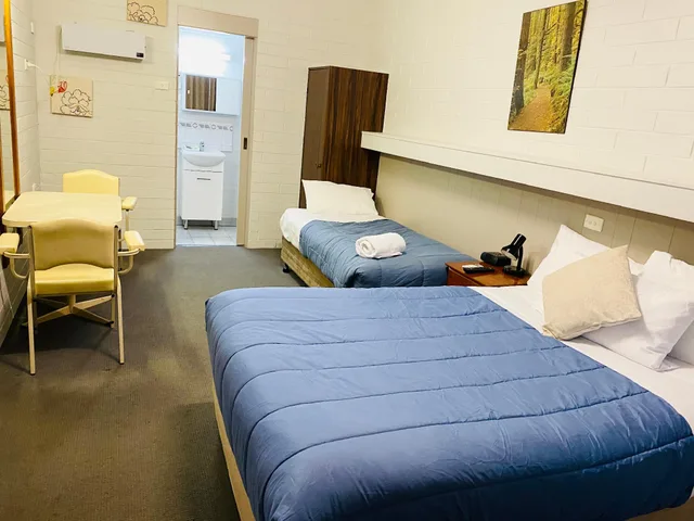 غرفة بسريرين منفصلين، Millers Cottage Motel 1/2