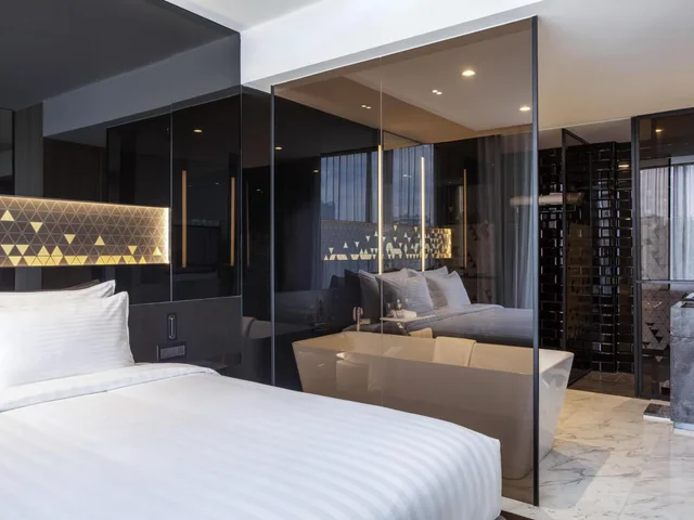 جناح بريميير بسرير كينج مع دخول الصالة في طابق مرتفع، NOVOTEL SINGAPORE ON STEVENS 3/10