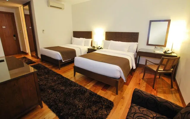 Superior, 1 King and 2 Queen Beds, City Garden Grand Hotel 1/1