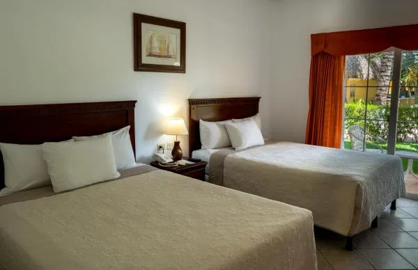 غرفة ديلوكس بسرير كوين، Hotel Cayman Suites 1/1