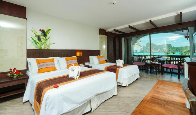 غرفة ديلوكس ثلاثية بسريرين مزدوجين، Phi Phi Island Cabana Hotel 1/1