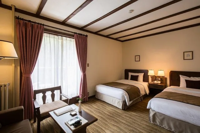 غرفة بسريرين منفصلين بشرفة، KAMIKOCHI IMPERIAL HOTEL 1/2