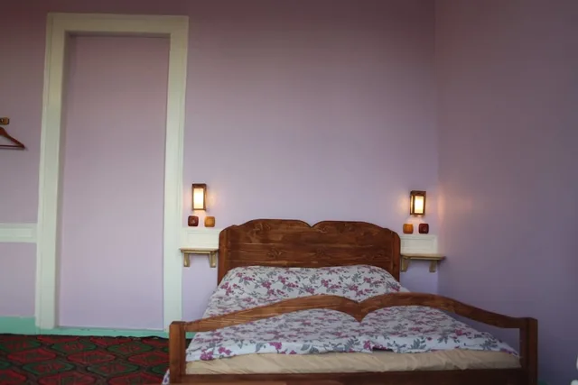 غرفة كلاسيكية بسرير مزدوج وسرير فردي بإطلالة على الحديقة، Lotus Garden Hostel 2/4