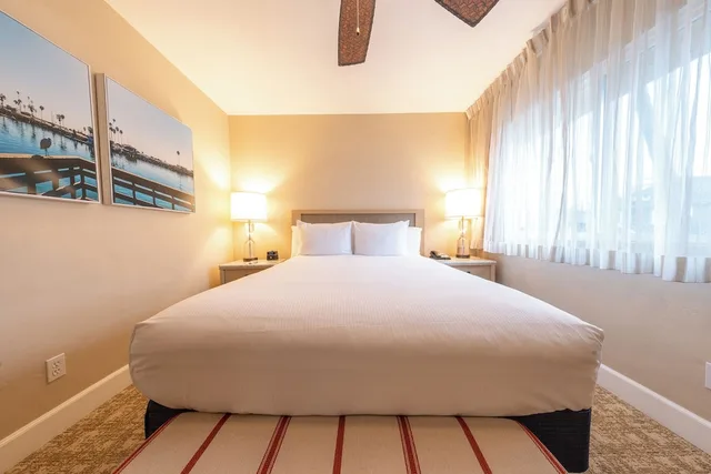 شقة سكنية بسريرين كوين بغرفتي نوم مع أريكة بمطبخ صغير، Southern California Beach Club 2/6