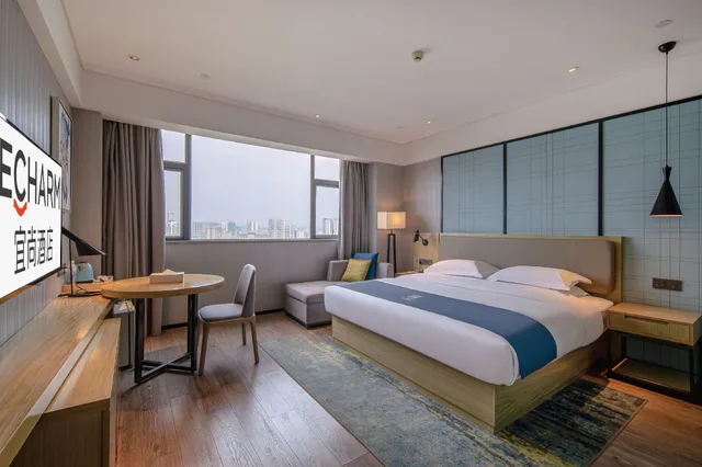 غرفة ديلوكس بسرير كينج بإطلالة على النهر، Echarm Hotel Nanning Jiangbin Park River view 1/2