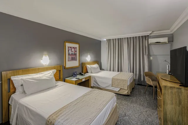 غرفة ديلوكس بسريرين منفصلين، Plaza Inn Executive 1/9