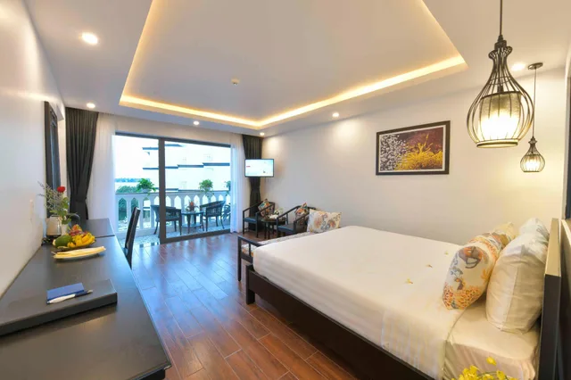 جناح جونيور بسرير كينج بشرفة، Gem Riverside Hotel Hoi An 2/2