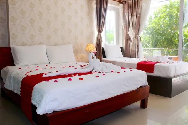 غرفة عائلية بسريرين مزدوجين بإطلالة على الحديقة، Hai Yen Resort 3/10