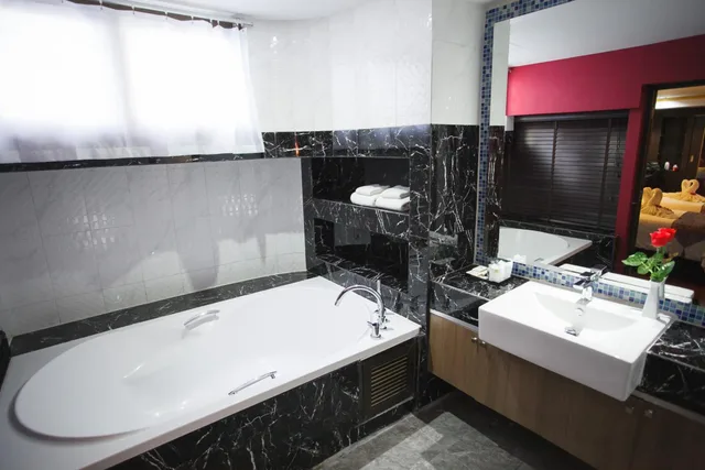 غرفة ديلوكس بسريرين منفصلين، Grand Pink Hotel Hat Yai 5/6