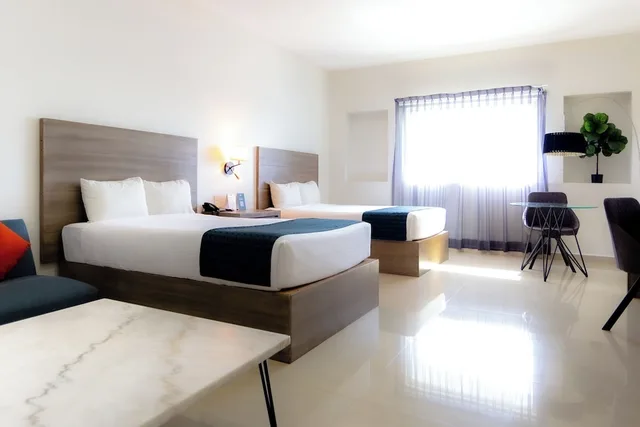 جناح استوديو عائلي بسريرين مزدوجين مع أريكة، InHouse Culiacan (ex. Monterreal Hotel) 1/9
