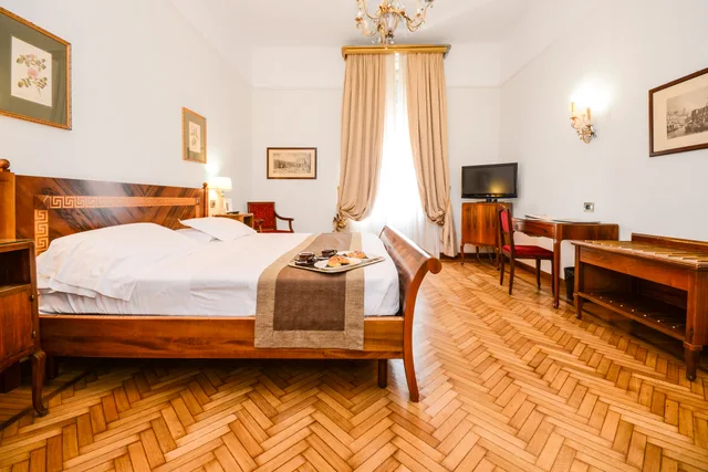 جناح بسرير كينج، Vittoria Hotel 1/4