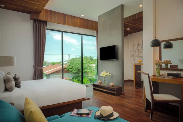 غرفة بريميوم بسرير كينج، Shintana Saya Residence 1/10