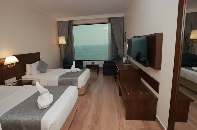 غرفة بريميوم بسريرين منفصلين، The Quilon Beach 1/8