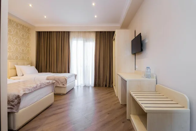 غرفة بسريرين منفصلين، Orchid Boutique Hotel 1/4