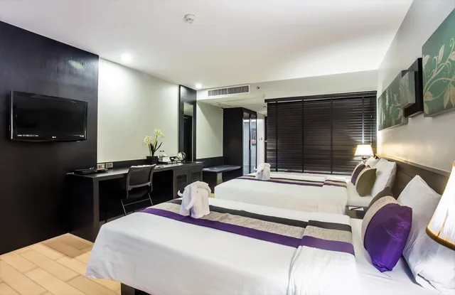 غرفة غراند ديلوكس ثلاثية بسرير مزدوج وسرير فردي، Nouvo City Hotel 8/9