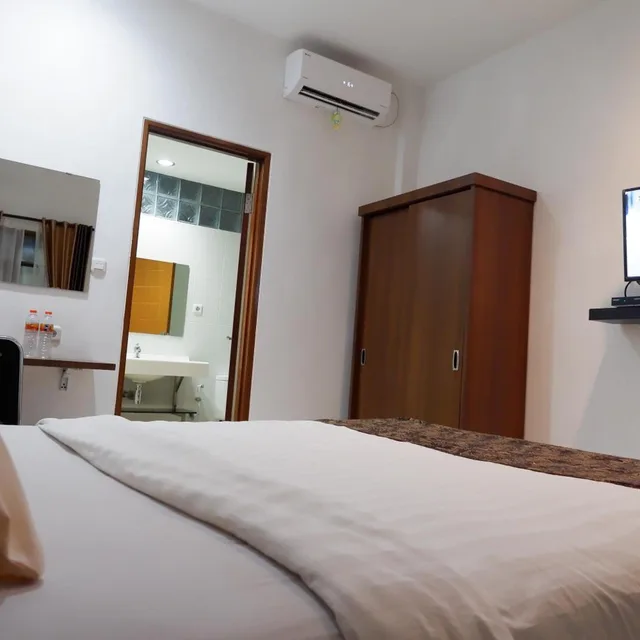 غرفة ديلوكس بسرير مزدوج أو سريرين منفصلين، Hotel Netral Jombang 4/10