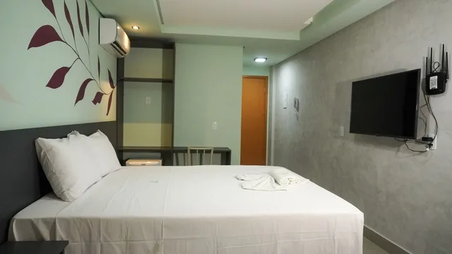 غرفة ديلوكس رباعية بسرير كوين وسريرين منفصلين، Pousada Flor De Magnolia 1/1