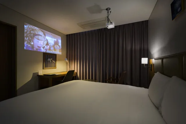 جناح عائلي بسرير مزدوج وسريرين منفصلين بإطلالة على البحر، Grabel Hotel Jeju 4/5