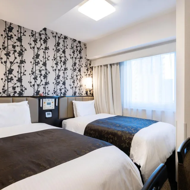 غرفة صغيرة بسريرين منفصلين، APA Hotel Takaoka Ekimae 1/6