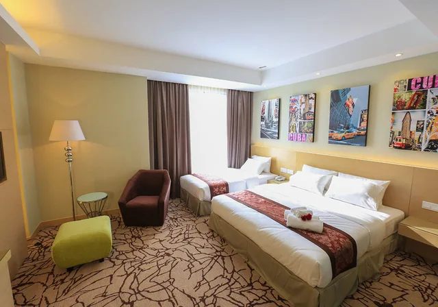 جناح تنفيذي بسرير كينج وسرير فردي، Eco Tree Hotel 1/4