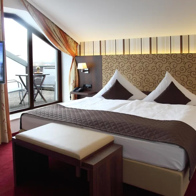 غرفة رباعية بسرير كينج، Lobinger Parkhotel 7/10