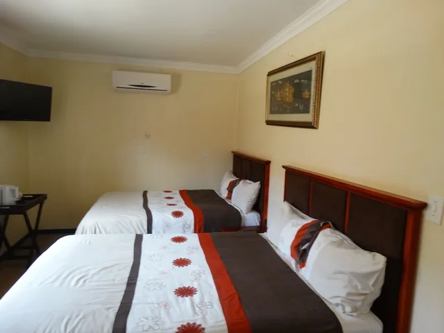 غرفة بسريرين مزدوجين، Global Village Guesthouse 1/5