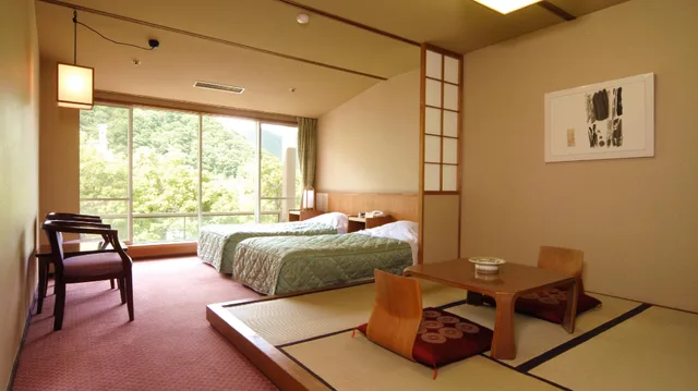غرفة يابانية غربية كومفورت رباعية بسريرين بإطلالة على الجبل في الطابق العلوي، Hotel Shikanoyu 1/1