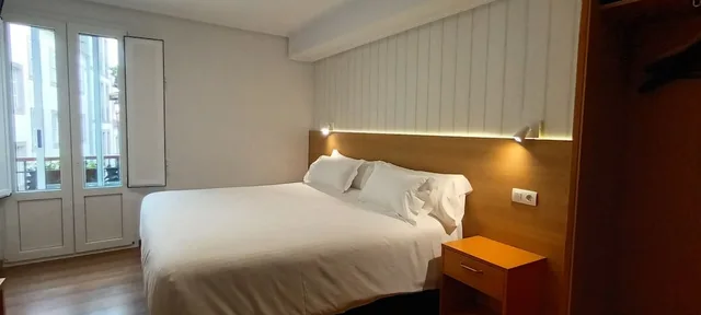 غرفة قياسية ثلاثية بثلاثة أسرّة، Anosa Casa Hostal 1/4