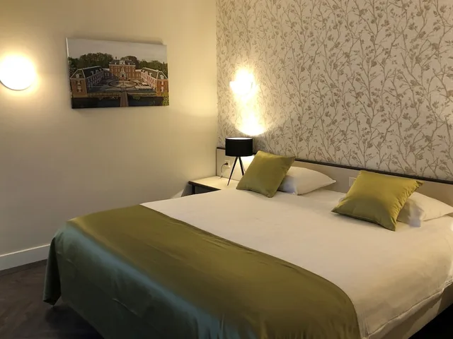غرفة فاخرة بسرير كينج، Hotel Restaurant Oud London 1/4